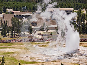 Aerial view of the Old Faithful geyser hot water eruptions