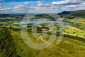Aerial view of an old hillfort and lake photo