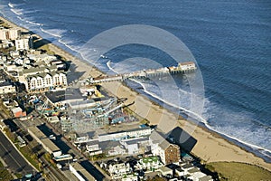 Aerial view of Old Orchard Beach downtown, pier, new hotel and amusement park on Maine Coastline south of Portland
