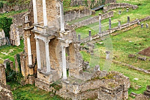 view of the old ruins of an ancient Roman amphitheater in Volterra, Italy