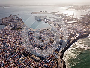 Aerial view of old town Cadiz with port and buildings at seashore