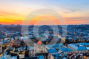 Aerial view of old town of Lviv in Ukraine at sunset. Lvov cityscape. View from tower of Lviv town hall