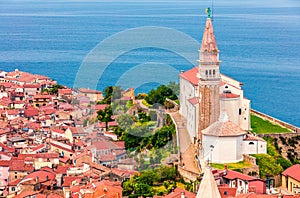 Aerial view of old town Piran. Colorful spring morning on Adriatic Sea. Beautiful cityscape of Slovenia. Traveling concept