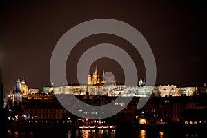 Aerial view of Old Town and Prague Castle at sunset in Prague, Czech Republic Prague bridges at dusk, shot from a bird`s eye view