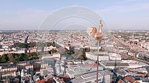 Aerial view of the old town of Riga and the golden cock on top of the St. Peter's Church.