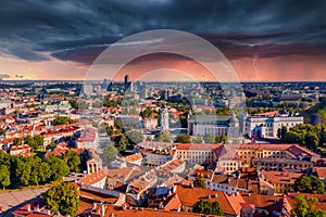 Aerial view of the old town of Vilnius, Lithuania on a stormy clouds background