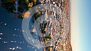 Aerial view of old town Zurich, Limmat river and lake Zurich. Aerial vertical, vertical video background.