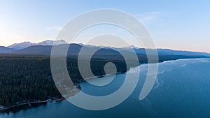 Aerial view of the Olympic Mountains and the Puget Sound at sunset from Potlatch, Washington in March 2023