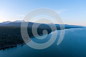 Aerial view of the Olympic Mountains and the Puget Sound at sunset from Potlatch, Washington in March 2023