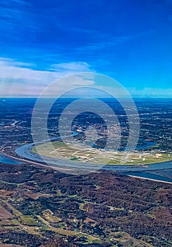 Aerial view of Omaha Eppley airport runways with surrounding rivers and farmland