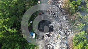 Aerial view open burn of rubbish near rural
