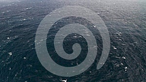 Aerial view of Open ocean waters, gale force winds and whitecaps at winter