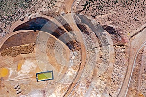 AERIAL VIEW OF OPEN PIT MINE WITH ENVIRONMENTAL REMEDIATION photo