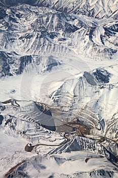 Aerial view of open-pit mine under snow, Chile