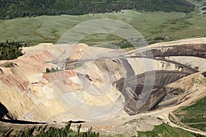 An aerial view of an open pit phosphate mine