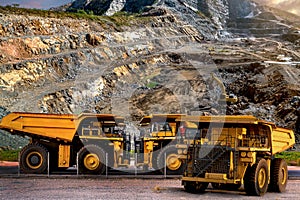 Aerial view of opencast mining quarry with lots of machinery at work - view from above.This area has been mined for copper, silver