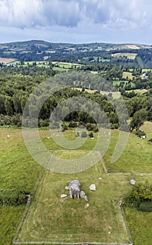 An aerial view over the ancient burial chamber at Pentre Ifan and surrounding countryside in Pembrokeshire, Wales