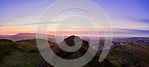 Aerial view over Arthur`s Seat mountain, the main peak of the group of hills in Edinburgh, Scotland