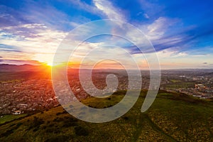 Aerial view over Arthur`s Seat mountain, the main peak of the group of hills in Edinburgh, Scotland