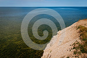 Aerial view over the Baltic sea from the Panga cliff in Saaremaa, Estonia during sunny day. the highest bedrock outcrop in western
