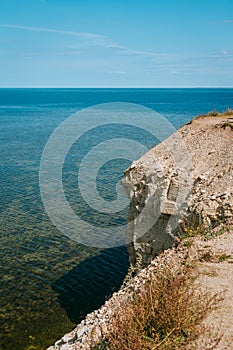 Aerial view over the Baltic sea from the Panga cliff in Saaremaa, Estonia during sunny day. the highest bedrock outcrop in western