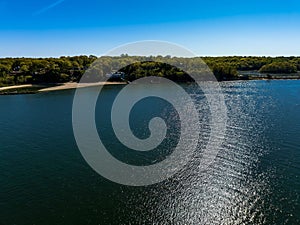 Aerial view over the calm waters in Oyster Bay near Lloyd Harbor, New York on a sunny day