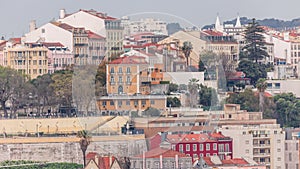 Aerial view over the center of Lisbon to the viewpoint called Miradouro de Sao Pedro de Alcantara timelapse.