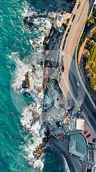 Aerial view over coast of Liguria, beach in Quarto dei Mille by Genova, Italy