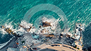 Aerial view over coast of Liguria, beach in Quarto dei Mille by Genova, Italy