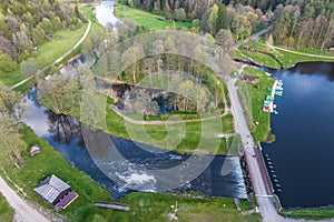 aerial view over dam lock sluice on lake impetuous waterfall photo