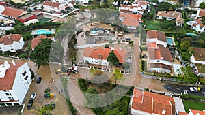 Aerial view over flooding streets,