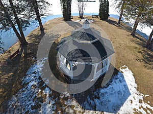 Aerial view over gazebo on lakefront