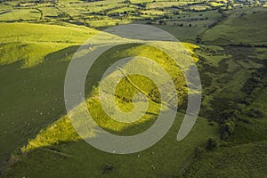Aerial View over Green Countryside Hills in UK photo