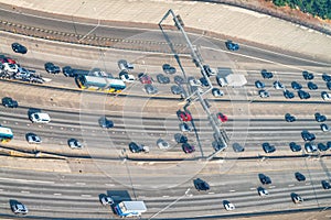 Aerial View over Interstate busy traffic on a sunny day. City Cityscape Urban Skyline, business concept