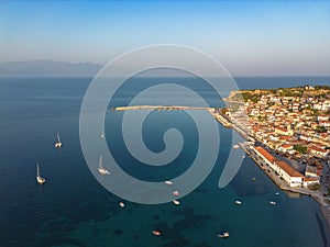 Aerial view over Koroni seaside city at sunset. Koroni, Messenia, Greece