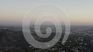 Aerial: view over Los Angeles in Hollywood Hills at Sunset, Los Angeles, California