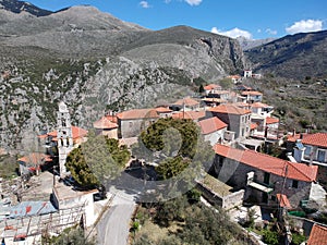 Aerial view over the old traditional stoned buildings and houses in Vorio village located near Kentro Avia and Pigadia Villages in