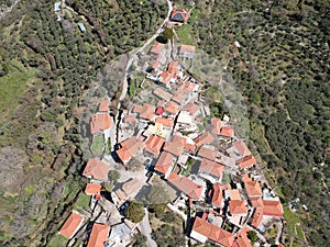 Aerial view over the old traditional stoned buildings and houses in Vorio village located near Kentro Avia and Pigadia Villages in