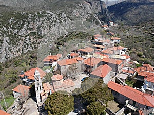 Aerial view over the old traditional stoned buildings and houses in Vorio village located near Kentro Avia and Pigadia Villages in