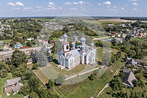 aerial view over othodox or catholic church in countryside