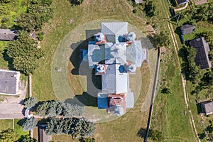 aerial view over othodox or catholic church in countryside