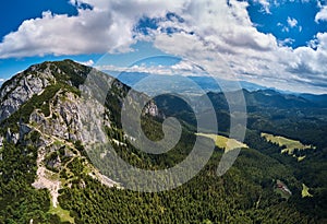 Aerial view over Piatra Craiului mountains peak in Transylvania, Romania