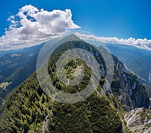 Aerial view over Piatra Craiului mountains peak in Transylvania, Romania