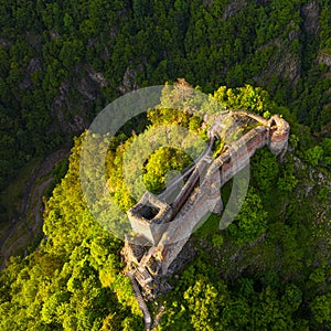 Aerial view over Poenari Fortress at the bottom of Fagaras Mountains in Romania