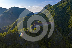 Aerial view over Poenari Fortress at the bottom of Fagaras Mountains in Romania