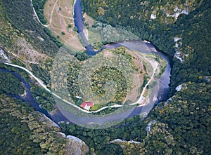 Aerial view over a river bend of Crisul Repede river in Suncuius, Transylvania, Romania