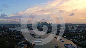 Aerial view over River Thames and Canary Wharf in London