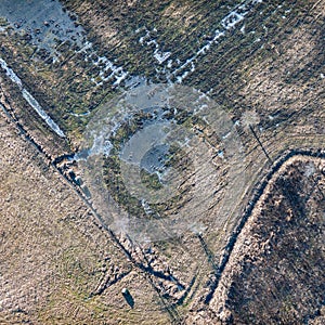 Aerial view over the rural fields in Latvia