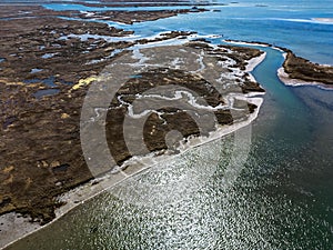 Aerial view over the salt marsh and wetlands in Freeport, New York on a sunny day