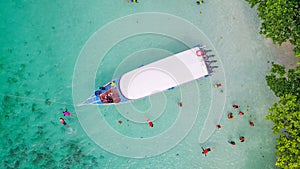 Aerial view over speed boat with beautiful sea and beach,Top vie